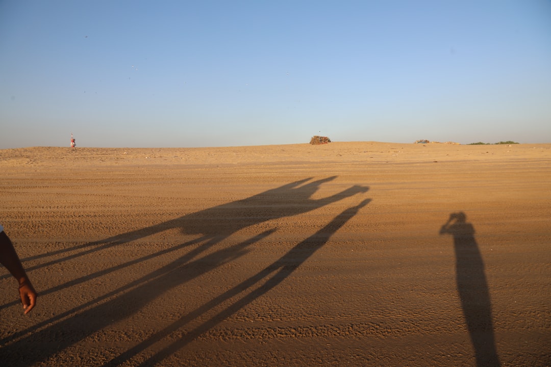 Minimal-impact desert camp with soft lantern light
